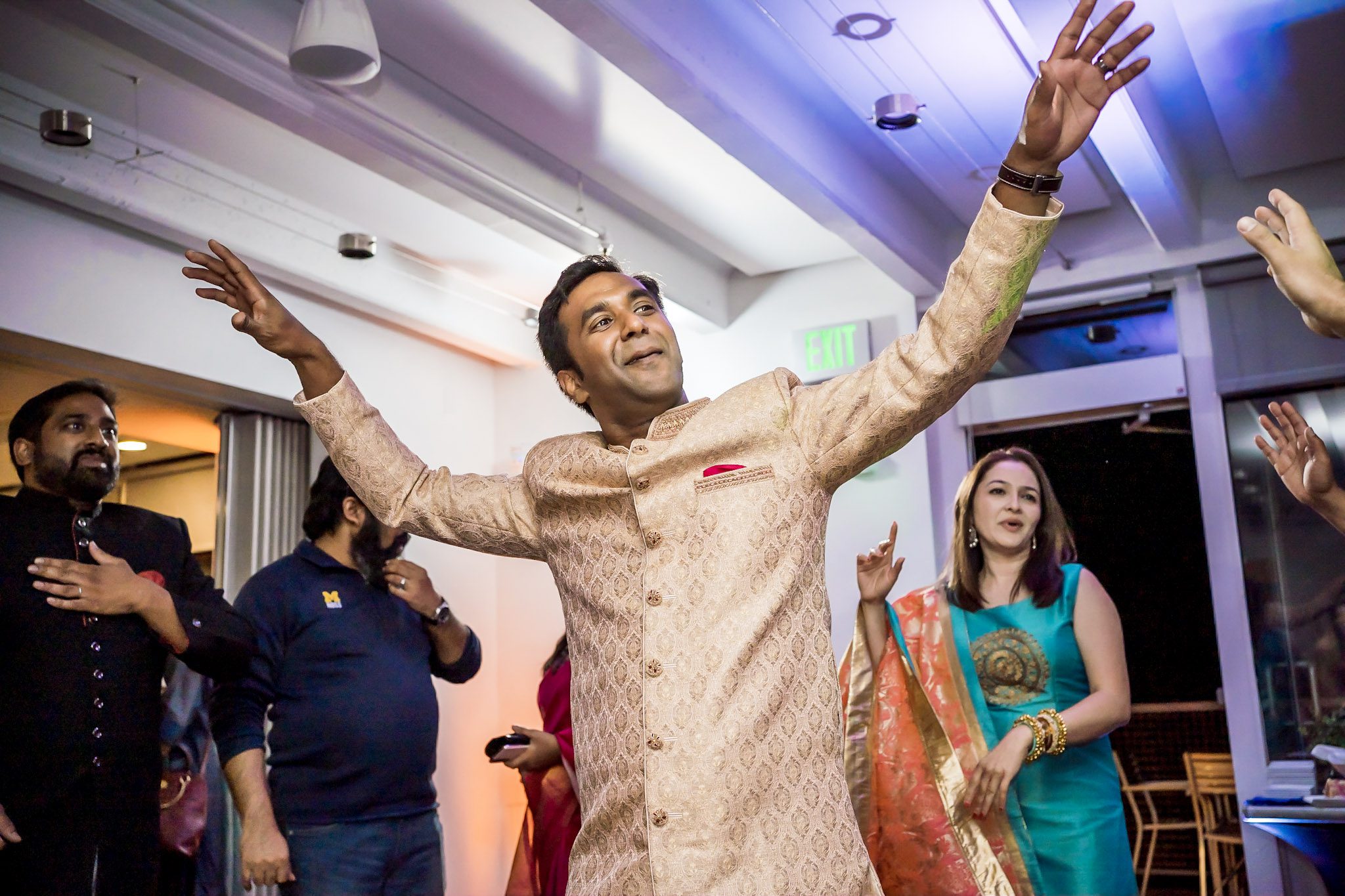 Colorful Southeast Asian wedding reception at the Aspen Meadows Resort in Aspen Colorado. Fall colors and fun dance party.