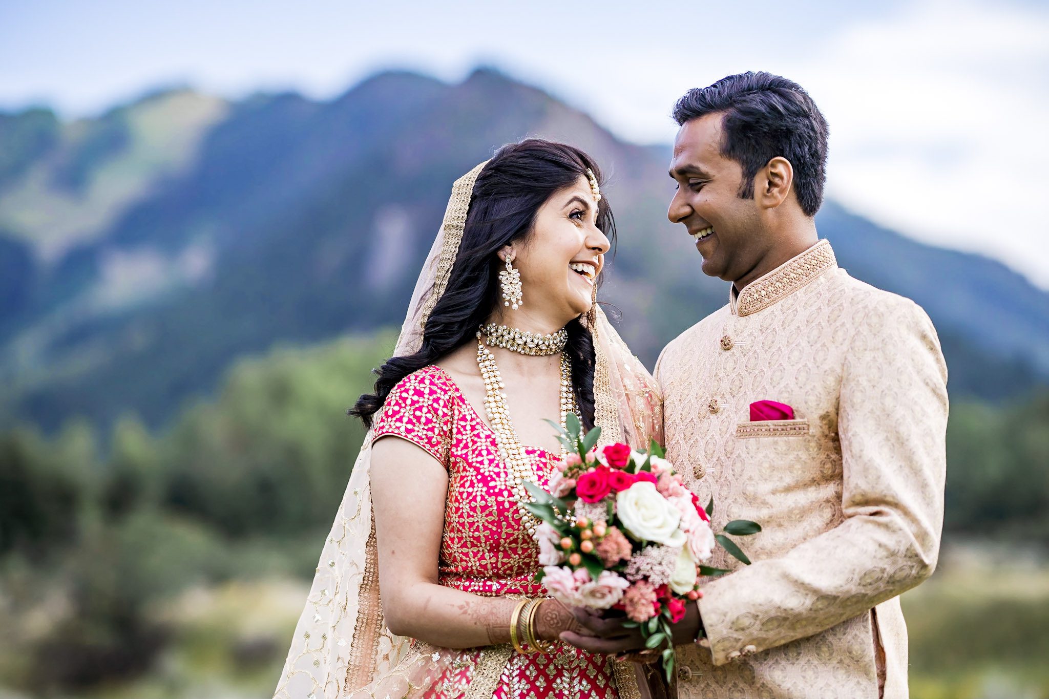 Colorful Southeast Asian wedding reception at the Aspen Meadows Resort in Aspen Colorado. Fall colors and fun dance party.