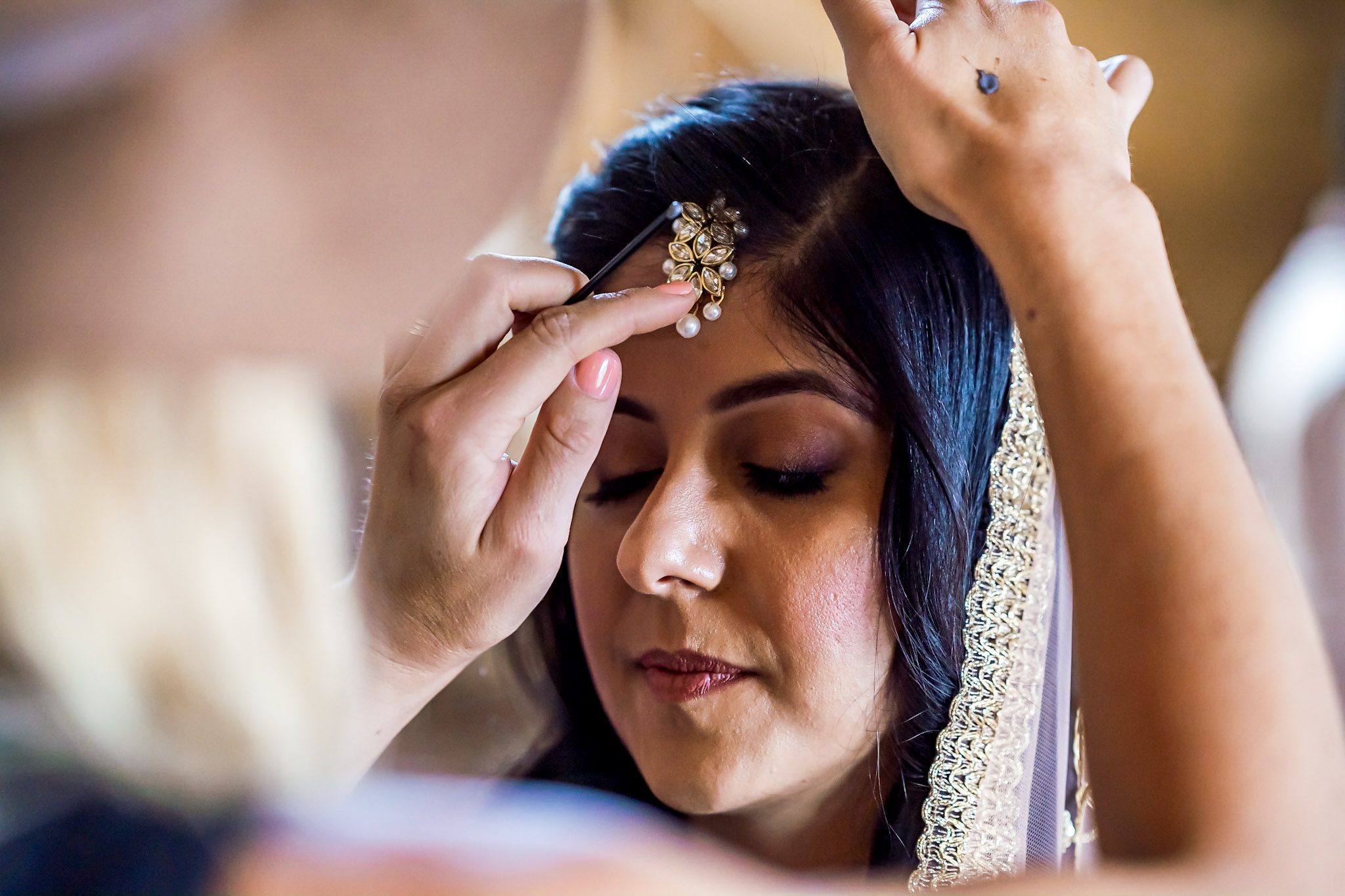 Colorful Southeast Asian wedding reception at the Aspen Meadows Resort in Aspen Colorado. Fall colors and fun dance party.