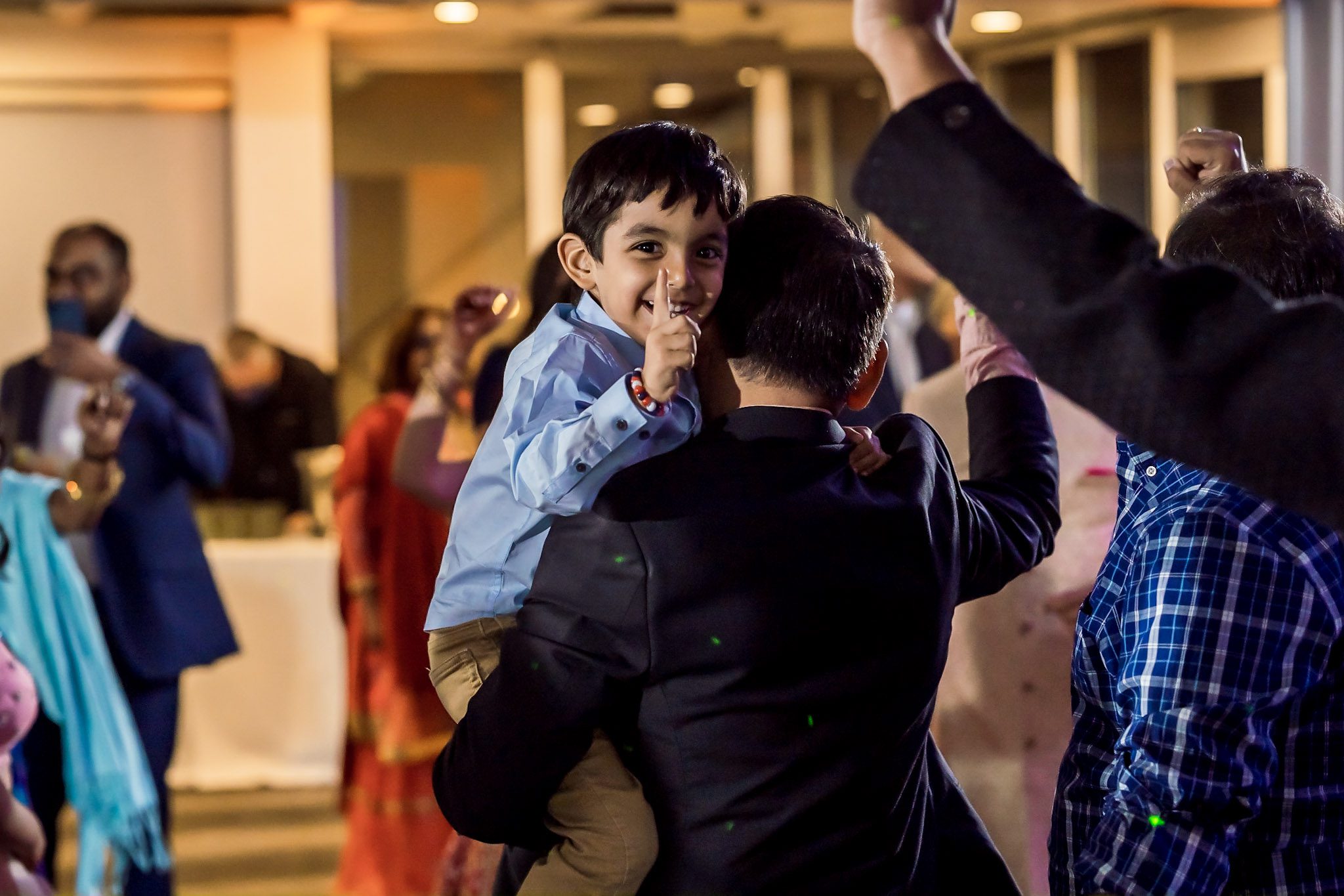 Colorful Southeast Asian wedding reception at the Aspen Meadows Resort in Aspen Colorado. Fall colors and fun dance party.