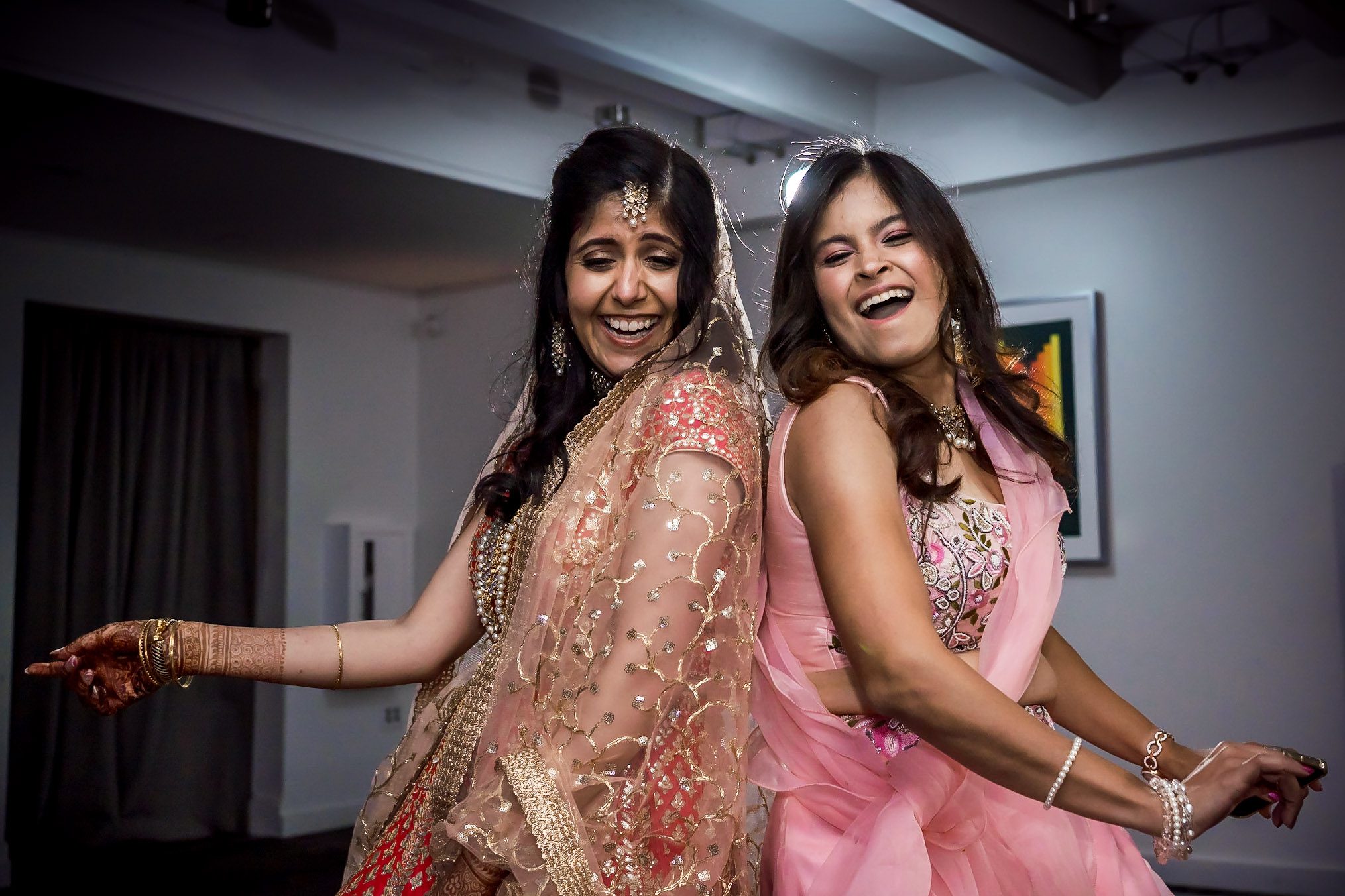 Colorful Southeast Asian wedding reception at the Aspen Meadows Resort in Aspen Colorado. Fall colors and fun dance party.