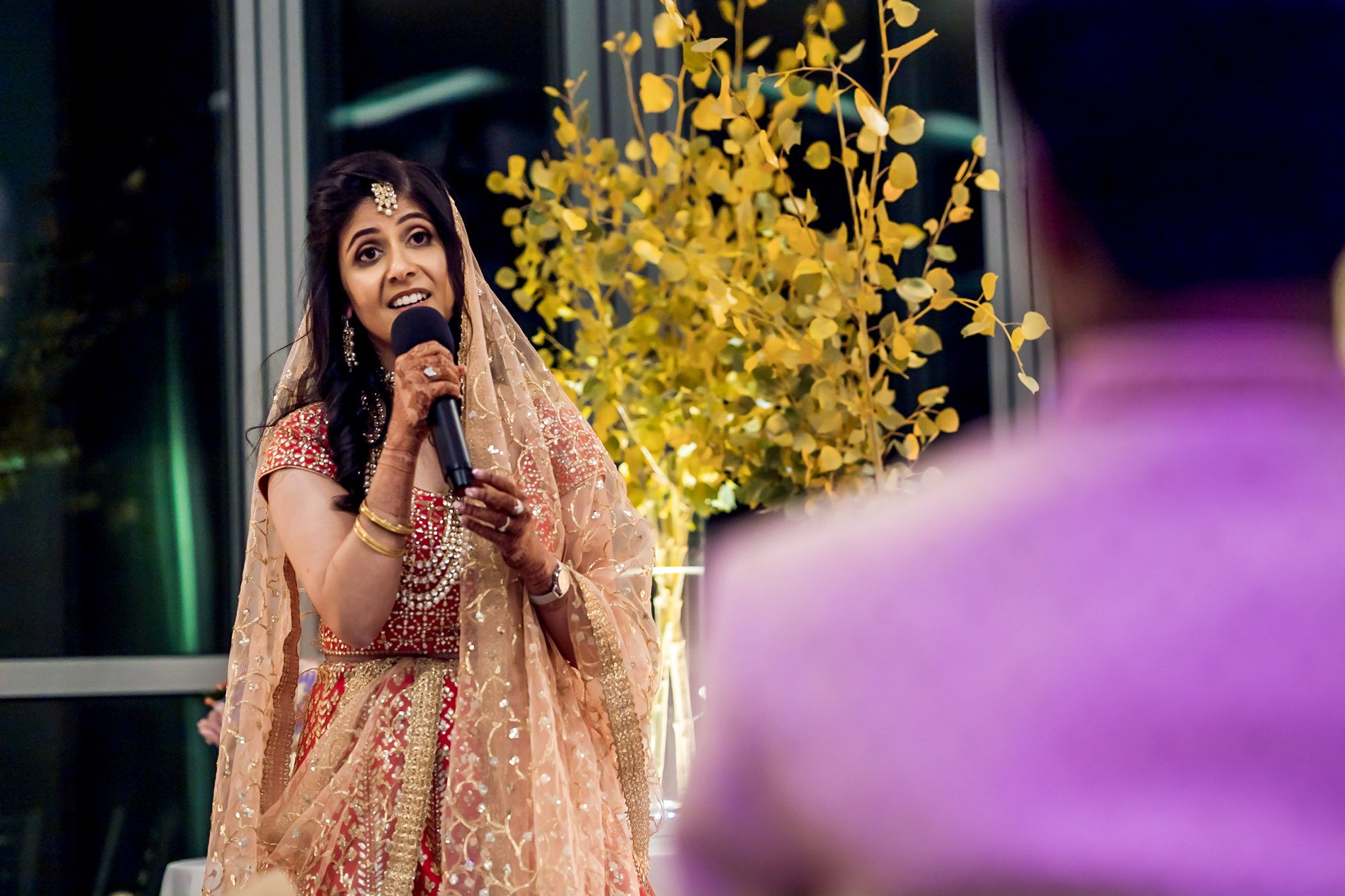 Colorful Southeast Asian wedding reception at the Aspen Meadows Resort in Aspen Colorado. Fall colors and fun dance party.