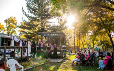 Autumn backyard wedding with a treehouse and trampoline in Lafayette, CO