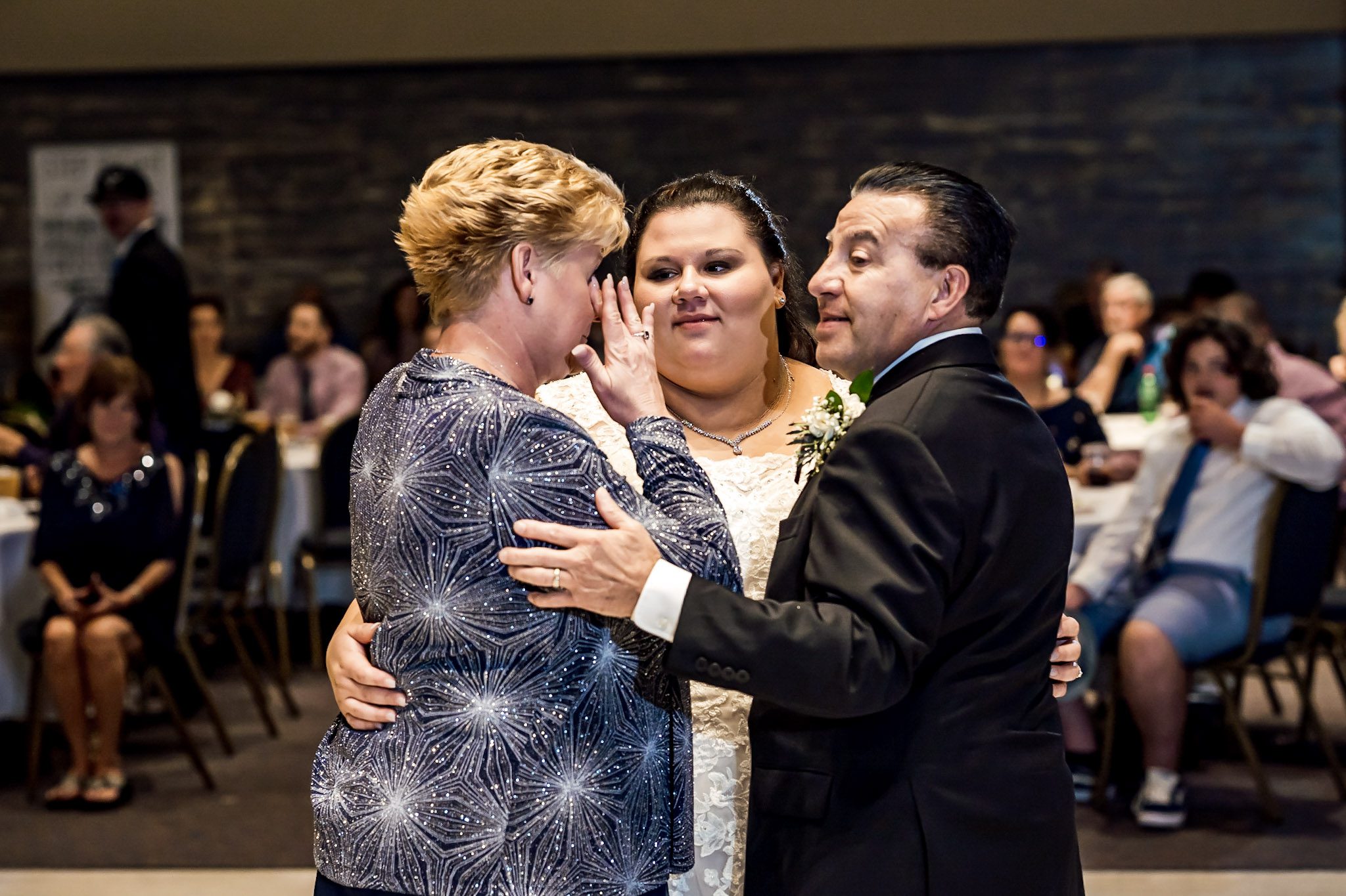 Bright and colorful wedding photography from a gorgeous Catholic Wedding Ceremony and the Sangre de Cristo Arts center in Pueblo Colorado