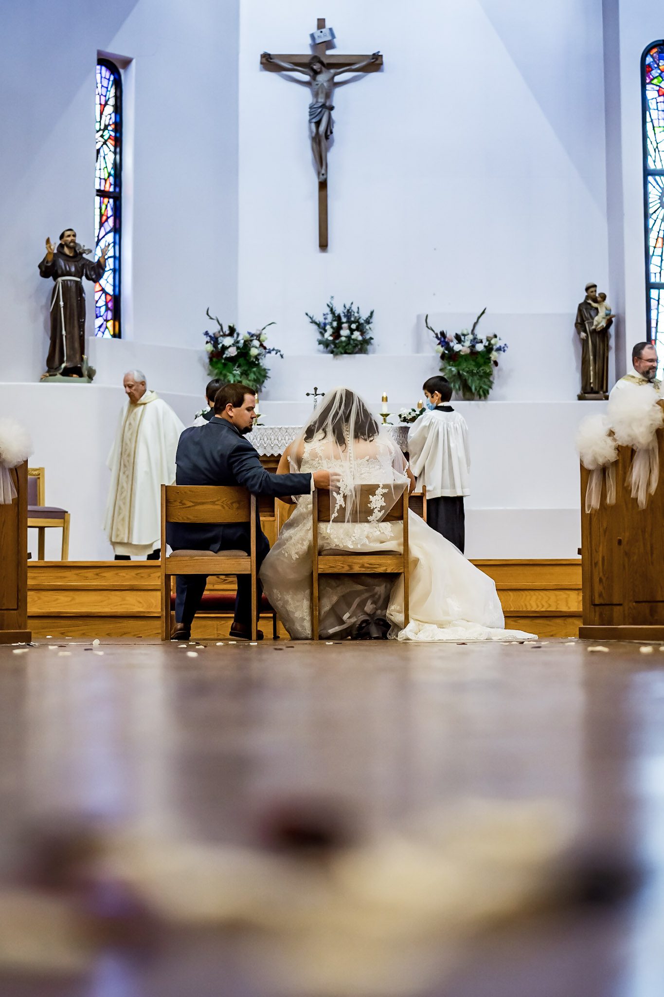 Bright and colorful wedding photography from a gorgeous Catholic Wedding Ceremony and the Sangre de Cristo Arts center in Pueblo Colorado