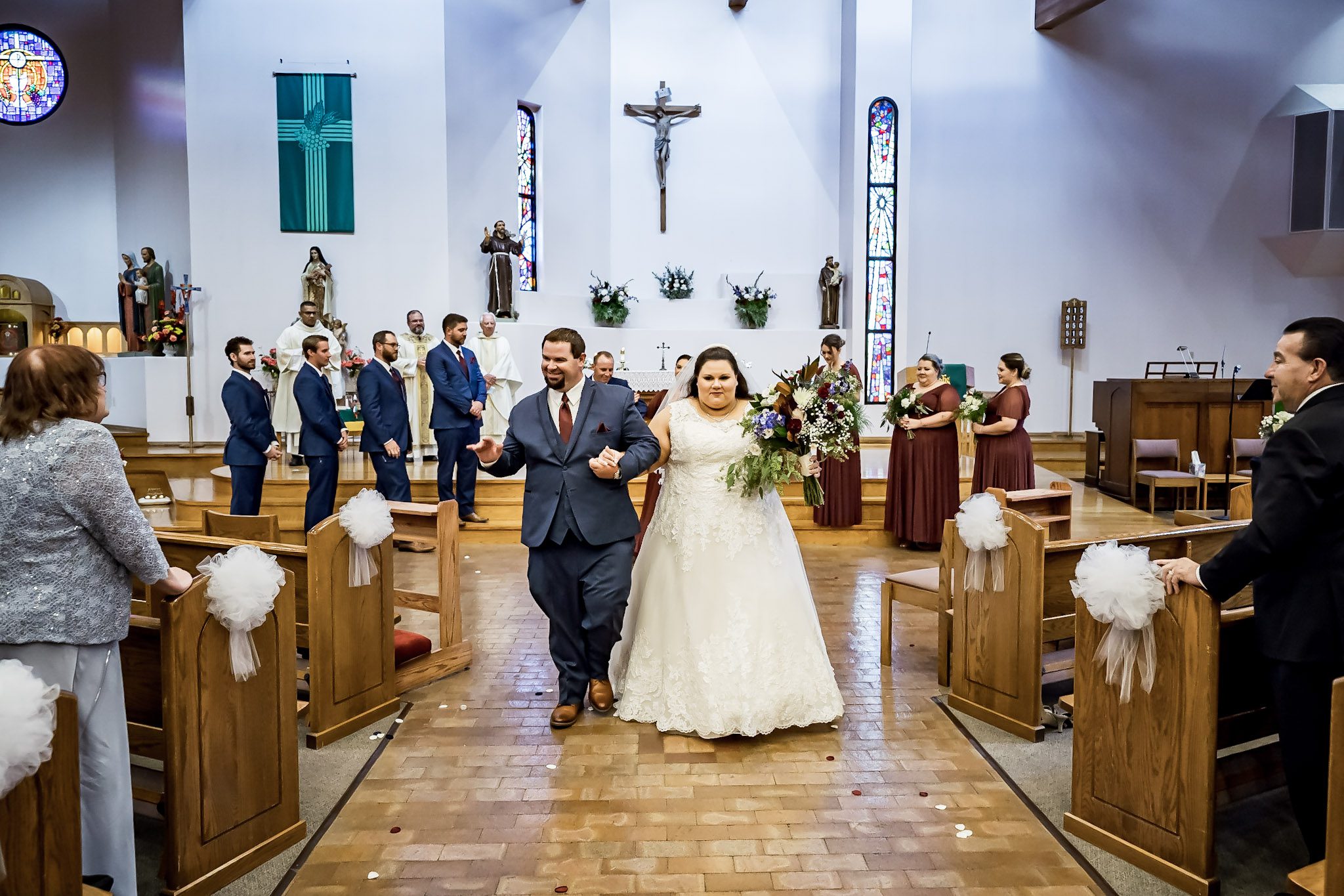 Bright and colorful wedding photography from a gorgeous Catholic Wedding Ceremony and the Sangre de Cristo Arts center in Pueblo Colorado