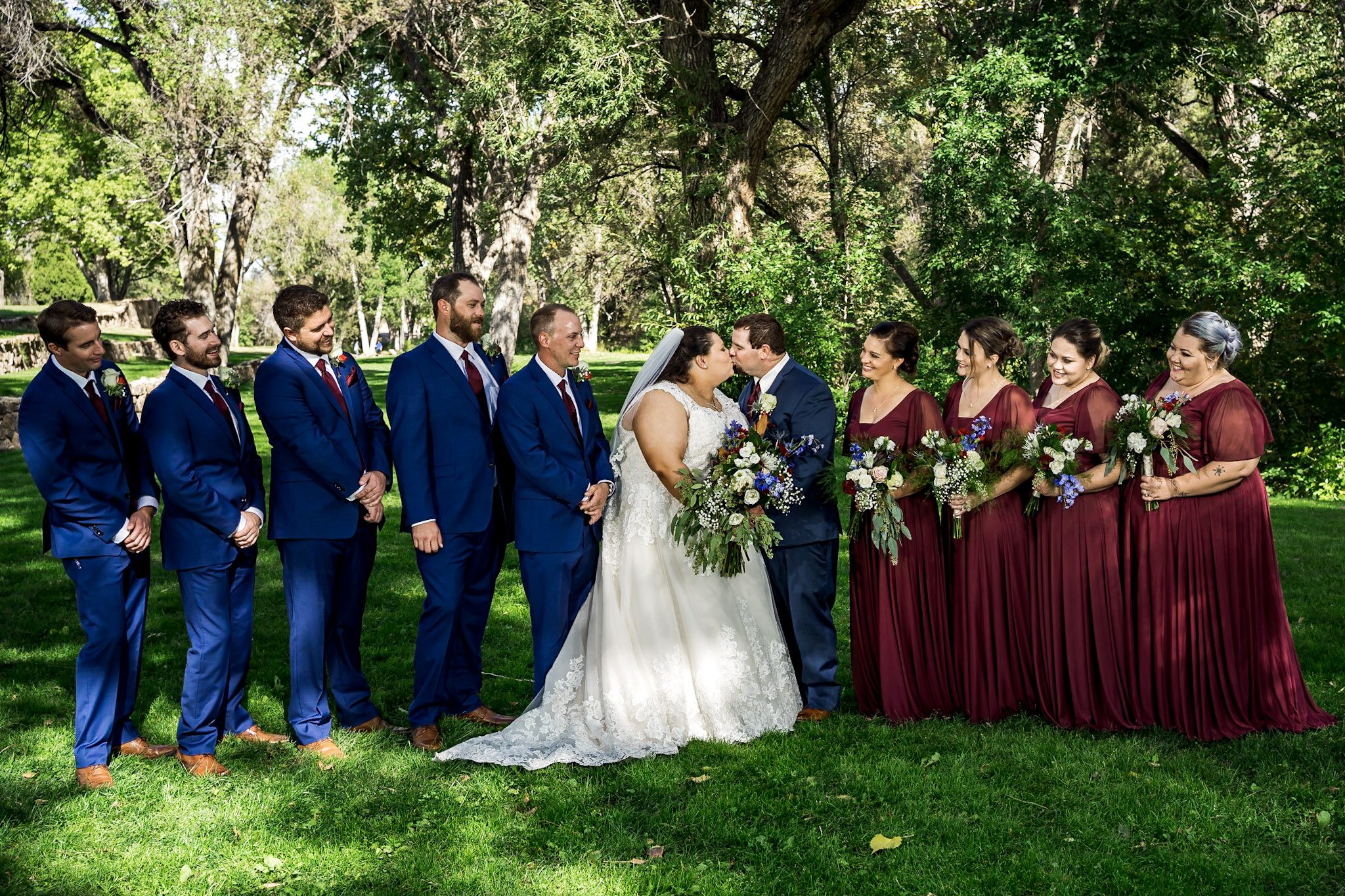 Bright and colorful wedding photography from a gorgeous Catholic Wedding Ceremony and the Sangre de Cristo Arts center in Pueblo Colorado